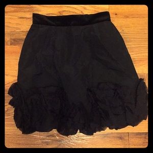 Black taffeta skirt.